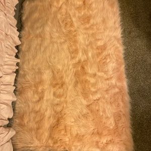 Pink fluffy rug